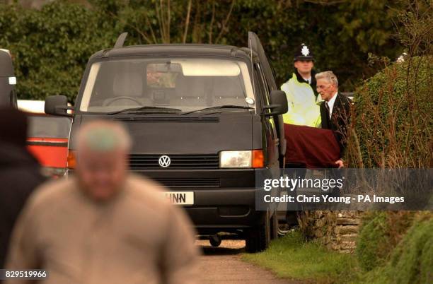 Body is removed from a house in Hockliffe. Detectives launched a double murder inquiry after the bodies of two women were discovered in the house.