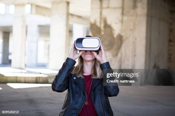 teenager loving her virtual reality headgear - cardboard vr stock pictures, royalty-free photos & images