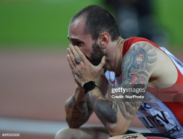 Ramil Guliyev of Turkey celebrates as he crosses the line to win the mens 200 metres final during day seven of the 16th IAAF World Athletics...