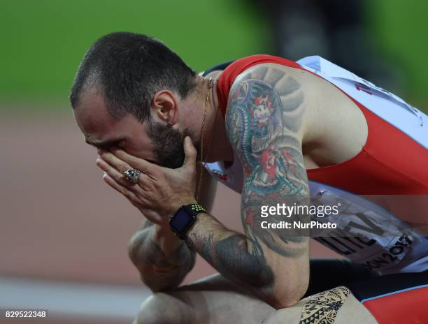 Ramil Guliyev of Turkey celebrates as he crosses the line to win the mens 200 metres final during day seven of the 16th IAAF World Athletics...
