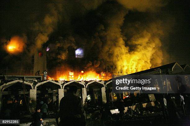 Smoke and fire fills the sky after a suicide truck bombing at the Marriott Hotel September 20, 2008 in Islamabad, Pakistan. The massive explosion...