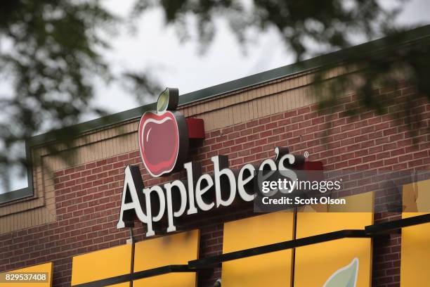 An Applebee's restaurant serves customers on August 10, 2017 in Chicago, Illinois. DineEquity, the parent company of Applebee's and IHOP, plans to...
