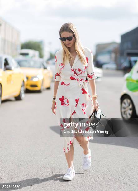 Pernille Teisbaek wearing dress outside Ganni on August 10, 2017 in Copenhagen, Denmark.