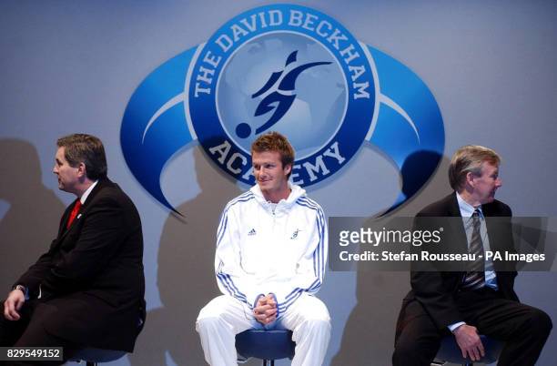 Real Madrid footballer David Beckham with Tim Leiweke of Anschutz Entertainment Group and Eric Harrison , Director of Coaching, during a press...