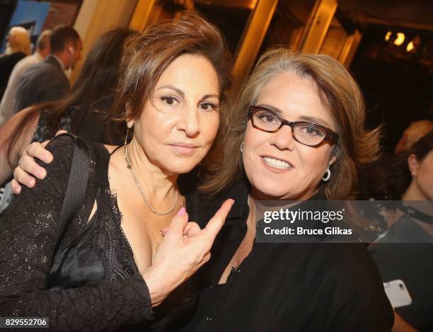 Kathy Najimy and Rosie O'Donnell pose at the opening night arrivals for Michael Moore's "The Terms Of My Surrender" on Broadway at The Belasco...