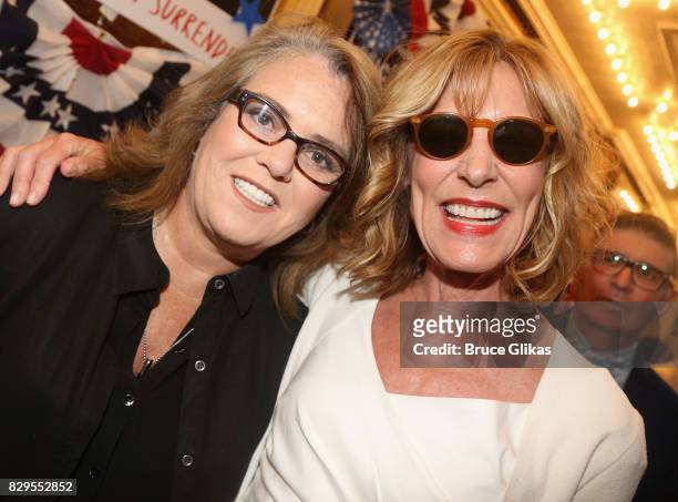 Rosie O'Donnell and Christine Lahti pose at the opening night arrivals for Michael Moore's "The Terms Of My Surrender" on Broadway at The Belasco...