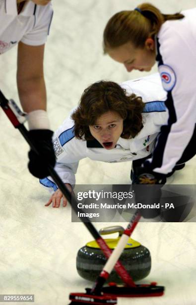 Switzerland's Mjam Ott gives directions to sweeper Bergette Schori during the game against Japan.