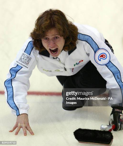 Switzerland's Mjam Ott gives directions to sweeper Bergette Schori in the game against Japan.