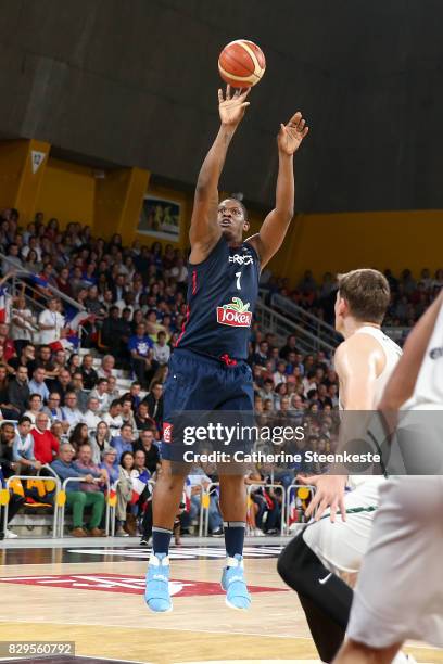 Kevin Seraphin of France is shooting the basket during the international friendly game between France v Lithuania at Palais des Sports on August 10,...