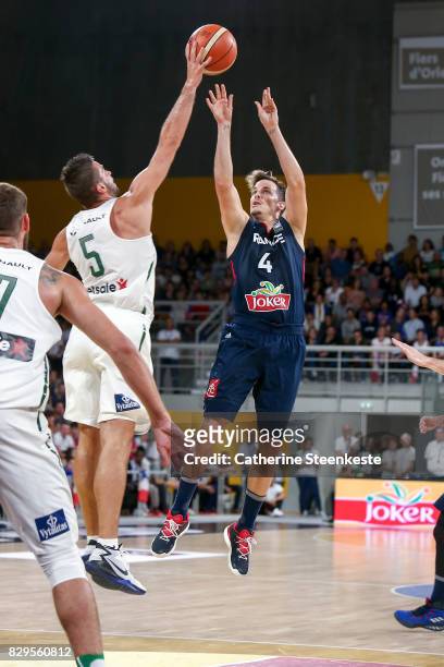 Thomas Heurtel of France is shooting the basket against Mantas Kalnietis of Lithuania during the international friendly game between France v...