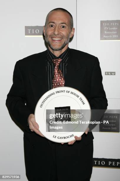 Michel Roux with award for Outstanding Front of House Team for Le Gavroche.