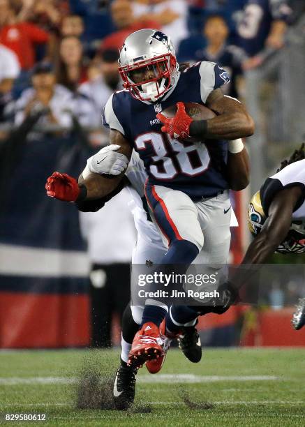 Brandon Bolden of the New England Patriots runs in the first half of a preseason game against the Jacksonville Jaguars at Gillette Stadium on August...