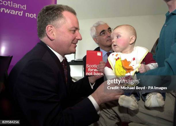 Scotland's First Minister Jack McConnell meets 6-month-old Darren Pointer.