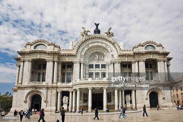 tourists in front of a palace, palacio de bellas artes, mexico city, mexico - palacio de bellas artes stock pictures, royalty-free photos & images