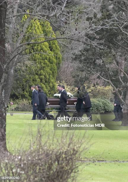 Relatives and friends carry Jorge Zorreguieta's coffin at Parque de la Memoria on August 10, 2017 in Buenos Aires, Argentina.