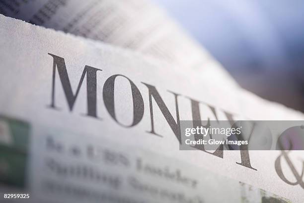 close-up of a financial newspaper - financial times stock pictures, royalty-free photos & images