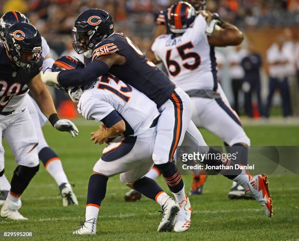 Leonard Floyd of the Chicago Bears sacks Trevor Siemian of the Denver Broncos during a preseason game at Soldier Field on August 10, 2017 in Chicago,...