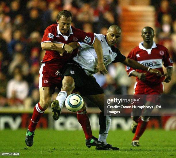 Middlesbrough's Ray Parlour challenges Fulham's Alain Goma .