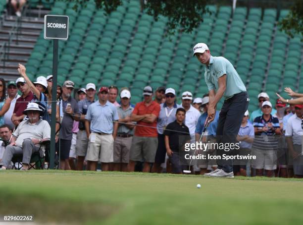 Webb Simpson watches his putt on the 9th green during the first round of the PGA Championship on August 10, 2017 at Quail Hollow Golf Club in...