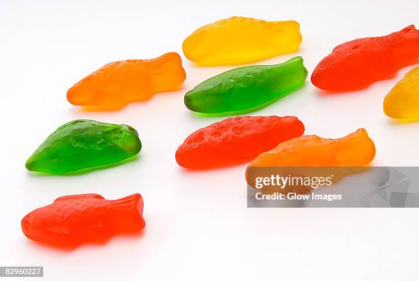 close-up of fish shaped jelly - jelly fish group photos et images de collection