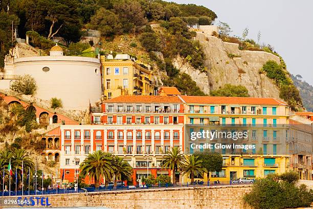 facade of a building, colline du chateau, la tour bellanda, nice, provence-alpes-cote d'azur, france - castle france stock-fotos und bilder