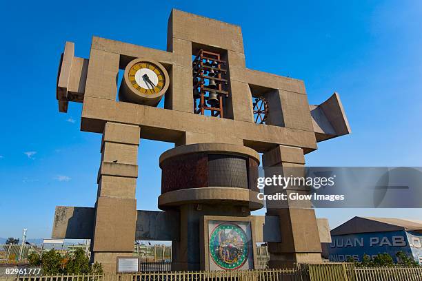 low angle view of a bell tower, basilica de guadelupe, mexico city, mexico - mexico city clock tower stock pictures, royalty-free photos & images