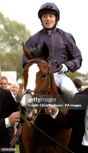 Jockey Kieren Fallon on Virginia Waters after winning the UltimatePoker.com 1000 Guineas Stakes.