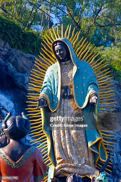 low angle view of a statue of virgin mary, virgin of guadalupe, tepeyac, mexico city, mexico - virgin of guadalupe stockfoto's en -beelden