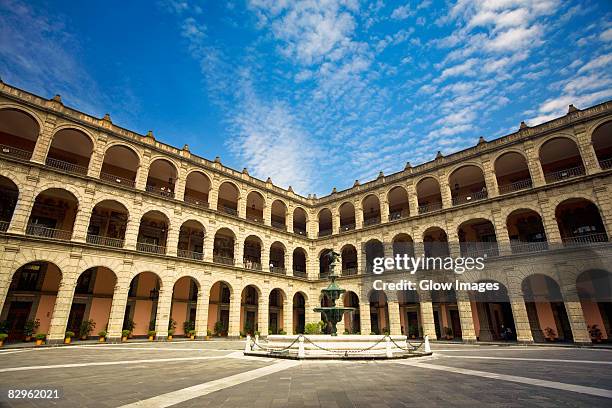 fountain in the courtyard of a government building, national palace, zocalo, mexico city, mexico - palacio nacional foto e immagini stock