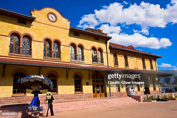 low angle view of a railroad station building, three centuries memorial park, aguascalientes, mexico - aguas calientes stock pictures, royalty-free photos & images