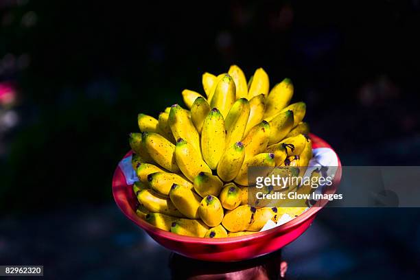 close-up of bananas in a fruit bowl, agua azul waterfalls, chiapas, mexico - agua azul stock-fotos und bilder