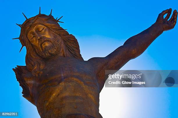 low angle view of a statue of jesus christ, broken christ, san jose de gracia, aguascalientes, mexico - aguas calientes stock pictures, royalty-free photos & images