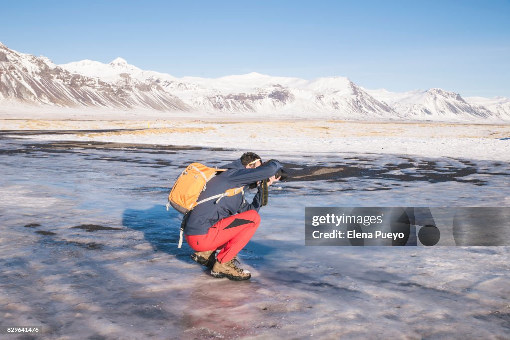 Photgrapher on Budir church, Iceland