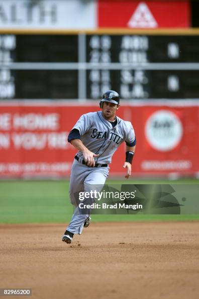 Jeremy Reed of the Seattle Mariners runs the bases during the game ...