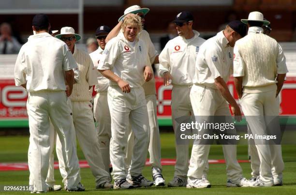 England's Simon Hoggard gets a pat on the head from Steve Harmison, after dismissing Bangladesh's Aftab Ahmed.