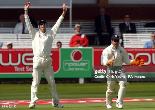Man of the match and England player Marcus Trescothick celebrates the fall of a Bangladeshi wicket with team-mate Geraint Jones.