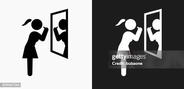brushing teeth icon on black and white vector backgrounds - woman brushing teeth stock illustrations