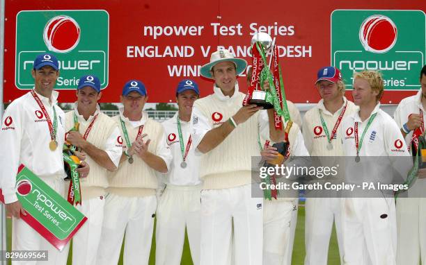 England captain Michael Vaughan lifts the npower trophy after beating Bangladesh.