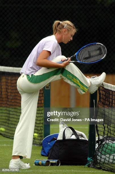 Wimbledon champion Maria Sharapova warms up to defend her title.