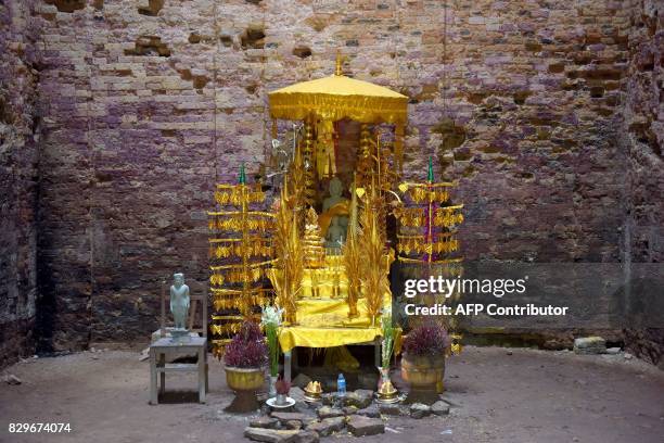 This photo taken on August 4, 2017 shows a shrine inside a temple in the ancient Sambor Prei Kuk complex in Kampong Thom province. It has survived...