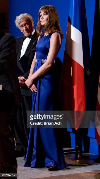 Author and humanitarian Elie Wiesel and first lady of France Carla Bruni-Sarkozy at the Elie Wiesel Foundation for Humanity to Honor French President...