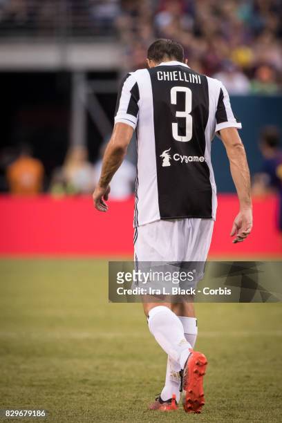 Captain Giorgio Chiellini of Juventus reacts after a missed shot on goal during the International Champions Cup match between FC Barcelona and...