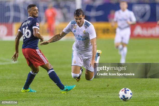 All-Star and Chicago Fire Defender Johan Kappelhof fouls Real Madrid defender Theo Hernandez in the first half during a soccer match between the MLS...