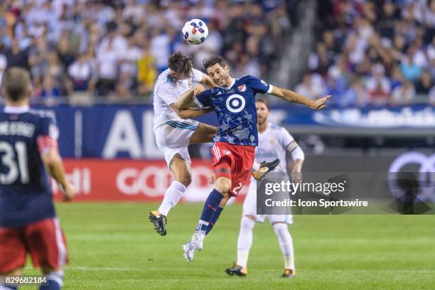 Real Madrid midfielder Marcos Llorente and MLS All-Star and Montreal Impact Midfielder Ignacio Piatti battle for a header in the first half during a...