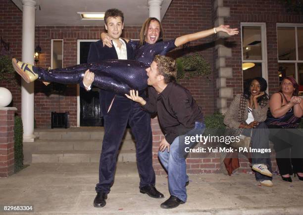 Richard Bacon holding Ricardo, with Craig Phillips biting his backside, as Josie D'Arby and Lizzy Bardsley look on. James Hewitt, the former lover of...