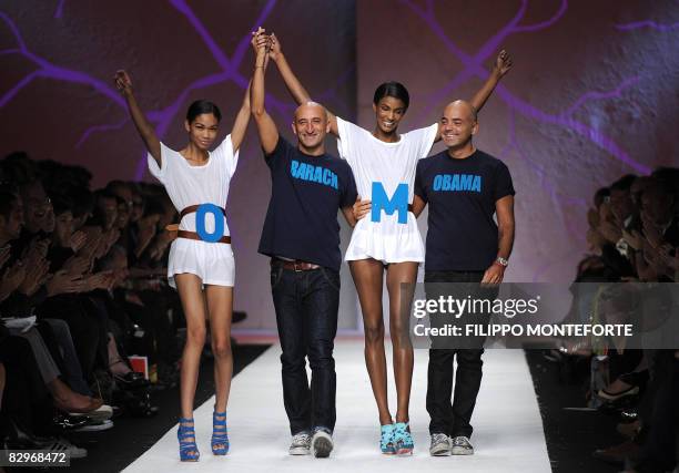 Designers of Italian fashion house Frankie Morello, Maurijo Modica and Pierfrancesco Gigliotti wear tee-shirts reading "Barack" and "Obama" at the...