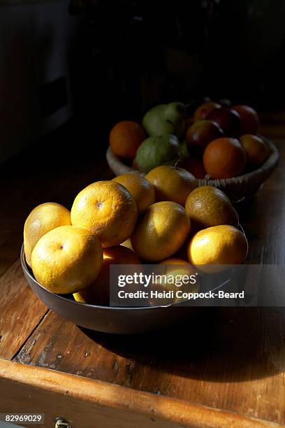 two bowls of fruit , still life. - heidi coppock beard stock pictures, royalty-free photos & images