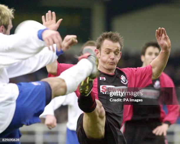 Bournemouth's James Hayter clashes with Rushden & Diamonds' Richie Hanlon during the Nationwide Division Two match at Nene Park, Rushden THIS PICTURE...