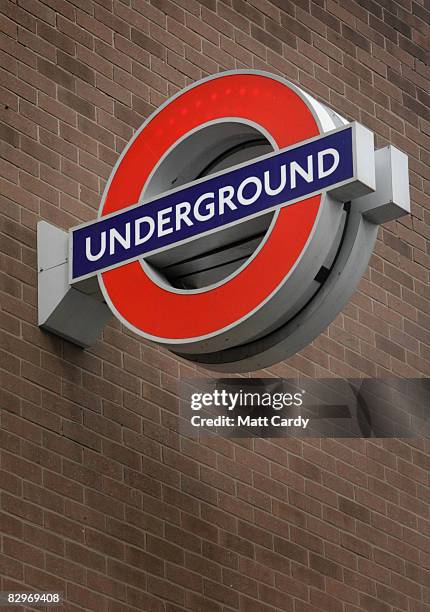 London Underground roundel is fixed to the wall outside as members of the jury sitting on the inquest into the shooting of Jean Charles de Menezes...
