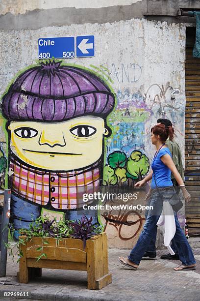 People walk in La Boca district on January 13, 2008 in Buenos Aires, Argentina. The Republic of Argentina is a former spanish colony and the capital...